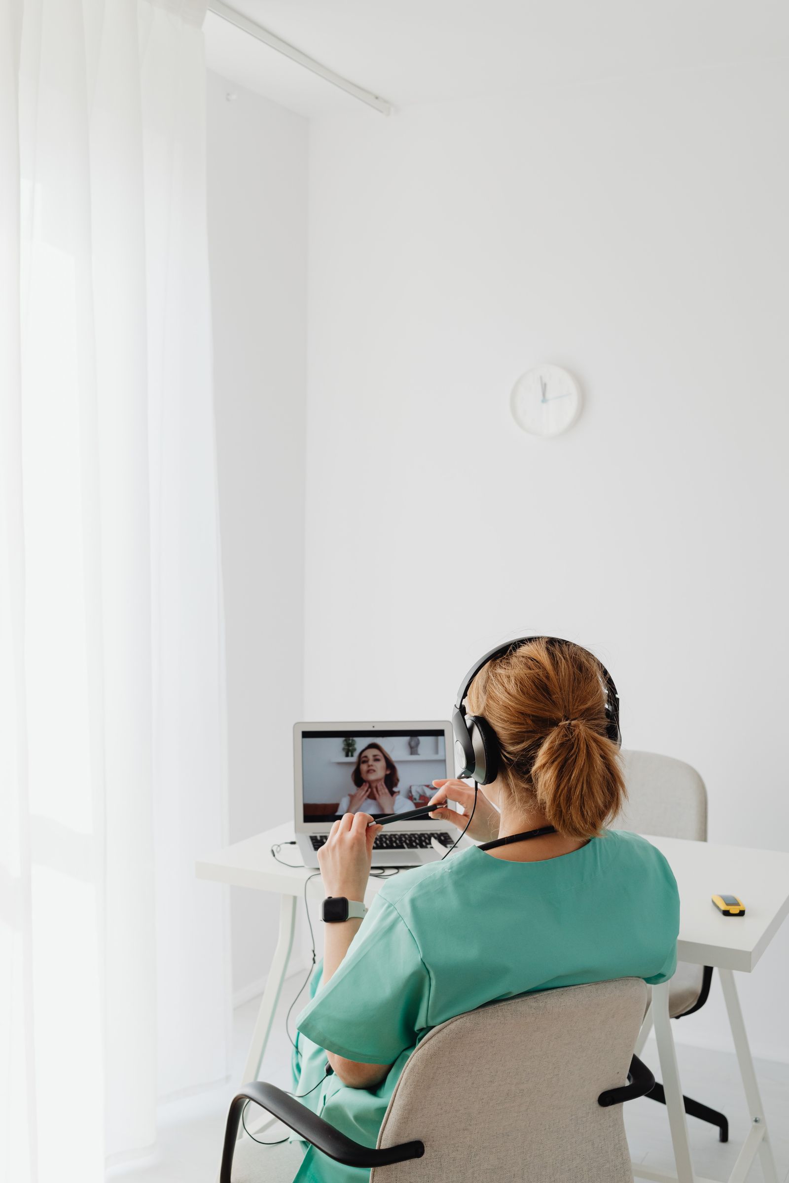 A patient speaking with a healthcare professional remotely